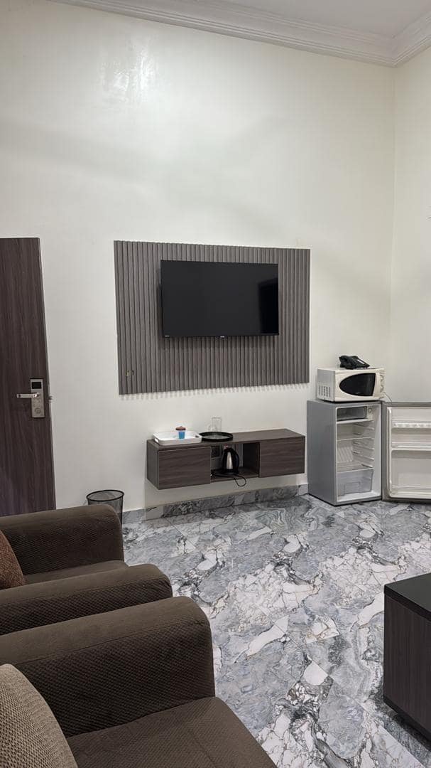 Business suite with television, tea station and mini fridge